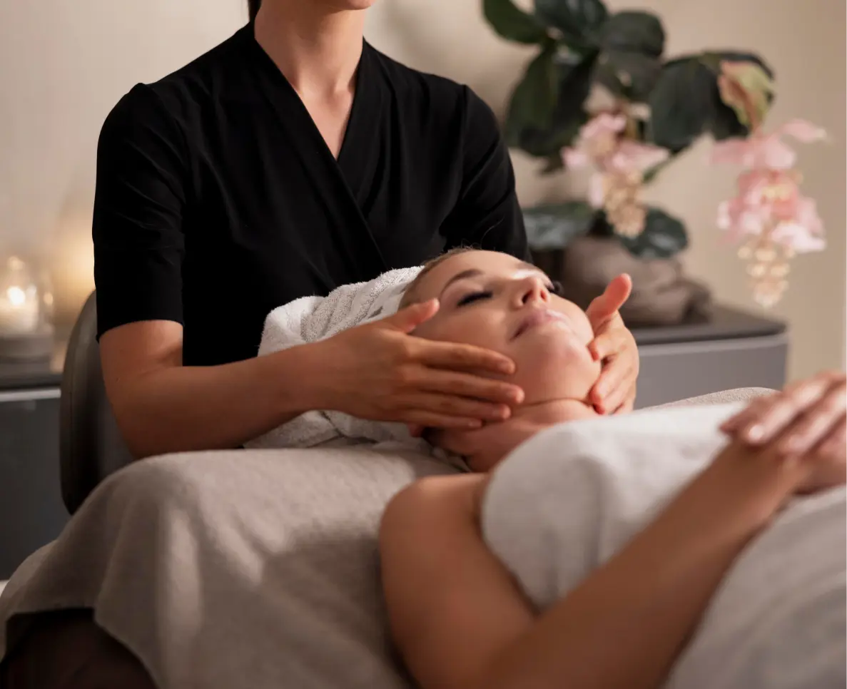 women getting face massage
